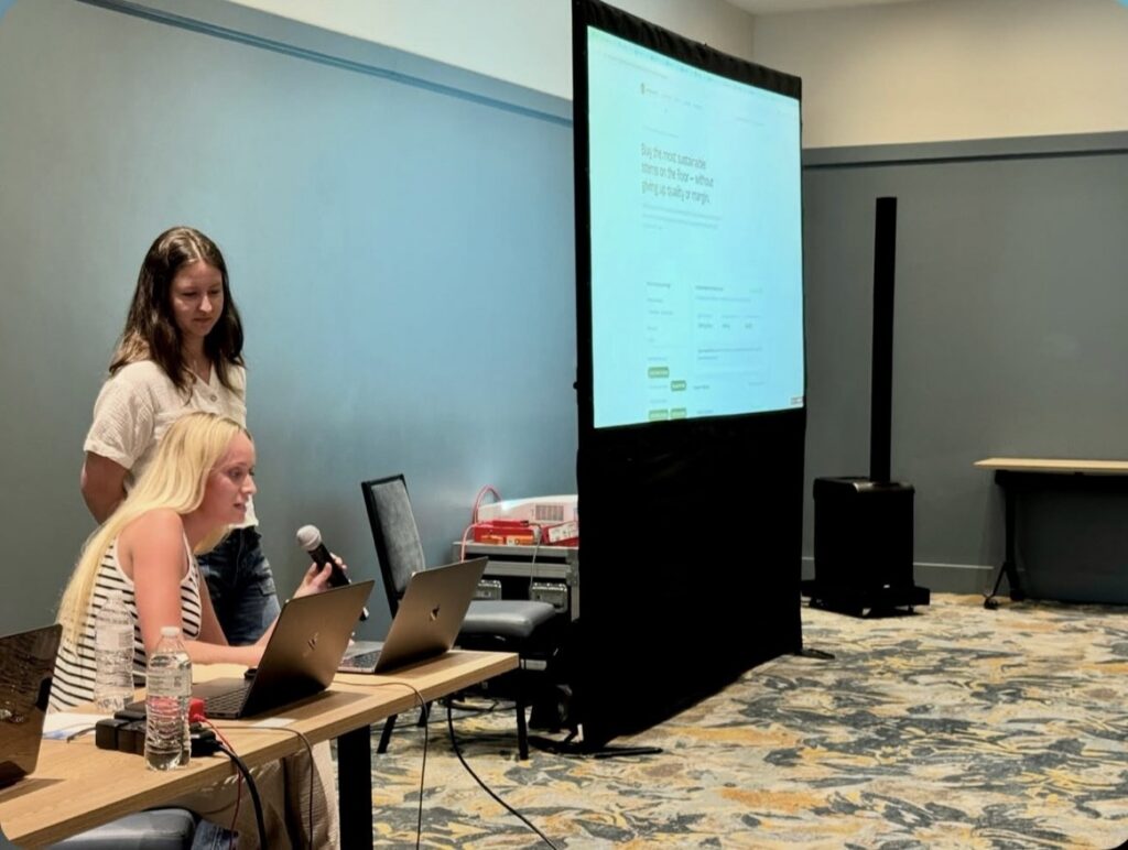 Emma and Morgan presenting at the DevX conference