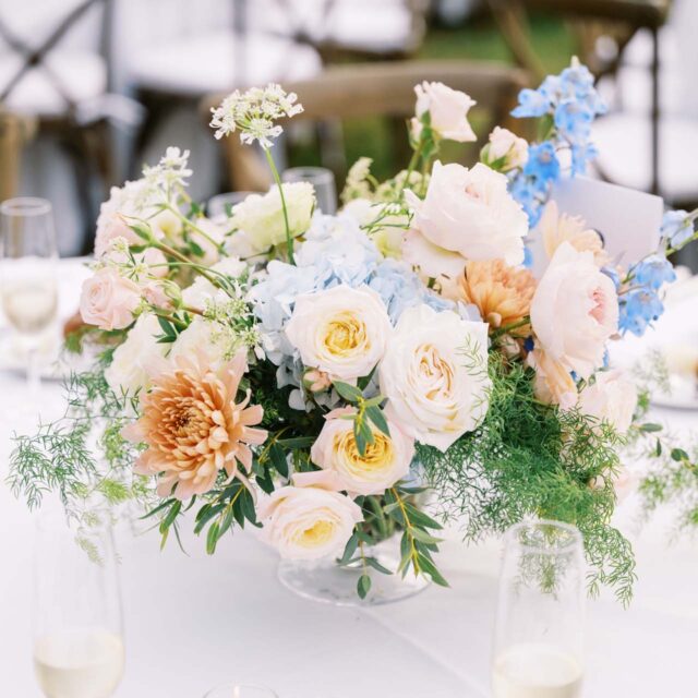 centerpiece on a table with a white tablecloth